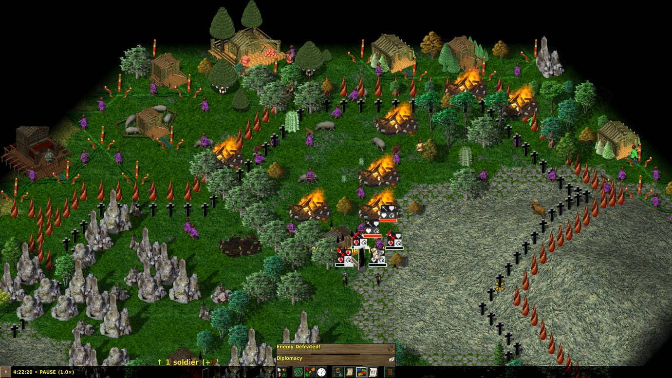 Collapsed homes on fire in Widelands.